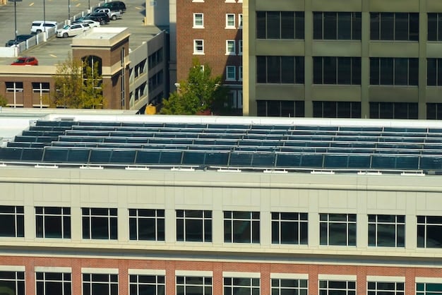A solar panel array on a rooftop of a commercial building in a city, symbolizing the use of renewable energy to power electric vehicles.