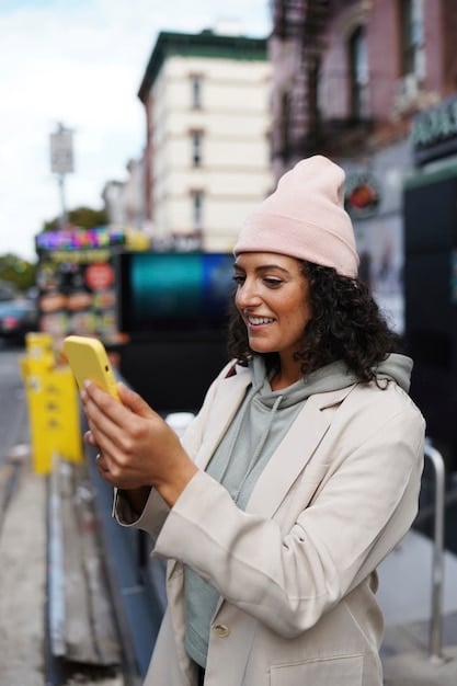 A person smiling while using a MaaS app on their smartphone, showing a variety of transportation options available nearby, including public transit schedules, bike-sharing locations, and ride-hailing services.