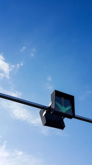 A close-up, detailed image of a next-generation transportation sensor mounted on a traffic light pole, capturing its sleek design and advanced components. The sensor is actively scanning its surroundings, represented by subtle light patterns, illustrating its role in monitoring traffic flow and environmental conditions.