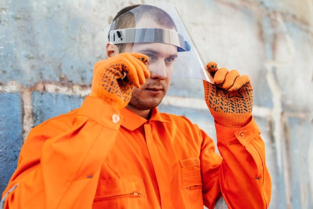 A close-up shot of a technician wearing protective gear, carefully examining the components of a disassembled electric vehicle battery, with various tools and testing equipment visible in the background.