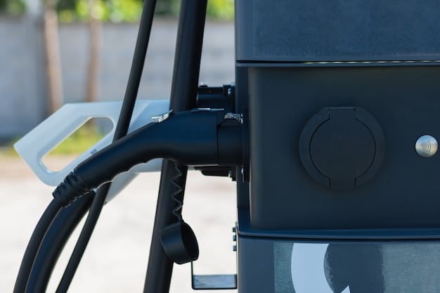 A close-up of an electric vehicle charging port, with a visible 