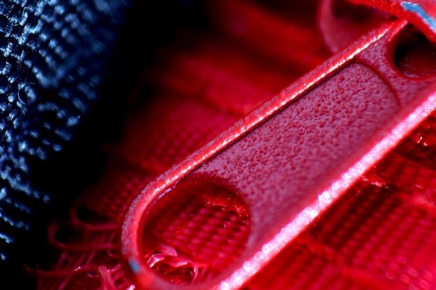A close-up shot of an advanced solid-state battery being tested in a laboratory, highlighting its compact design and high energy density. The image captures the cutting-edge technology and innovation behind EV battery development.