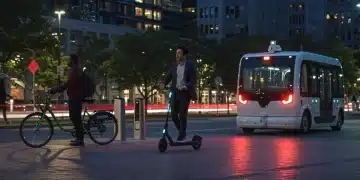 Urban street with diverse micro-mobility options like electric scooters and e-bikes